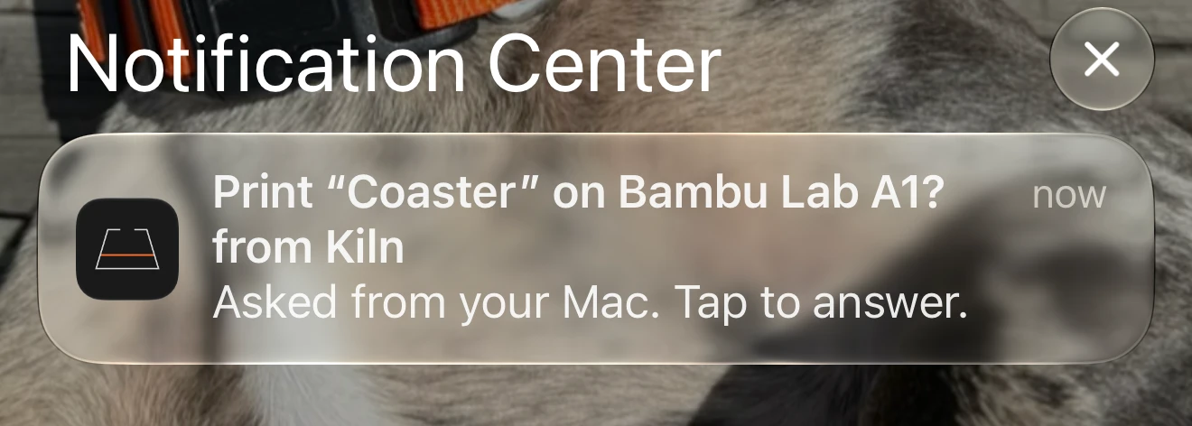 An iPhone notification from Kiln asking: Print Coaster on Bambu Lab A1?